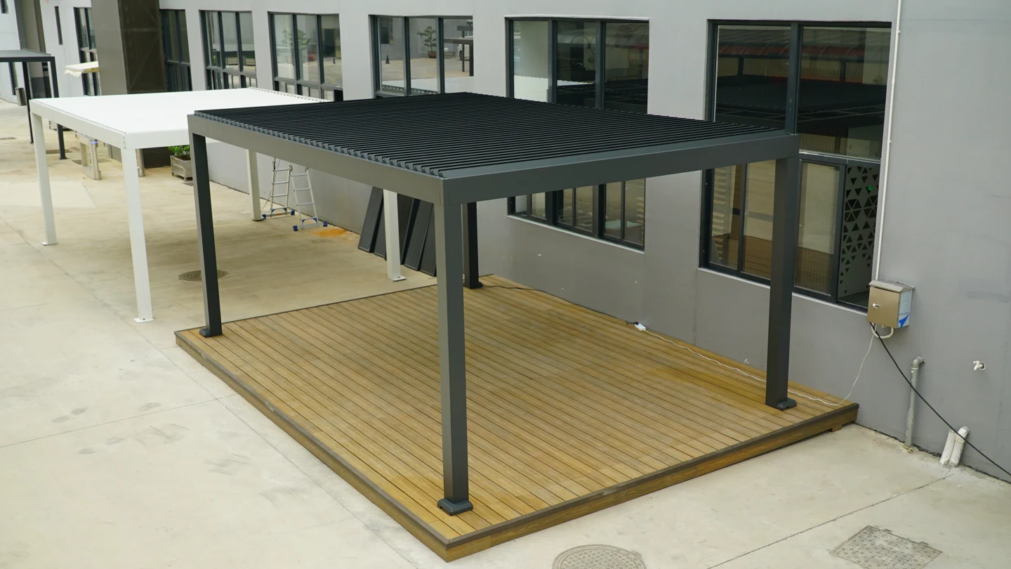 A freestanding louvered sample on a timber platform provides a useful reference for discussing support positions and usable floor space.