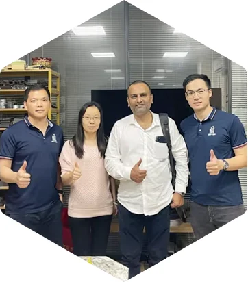 A group photograph inside the office